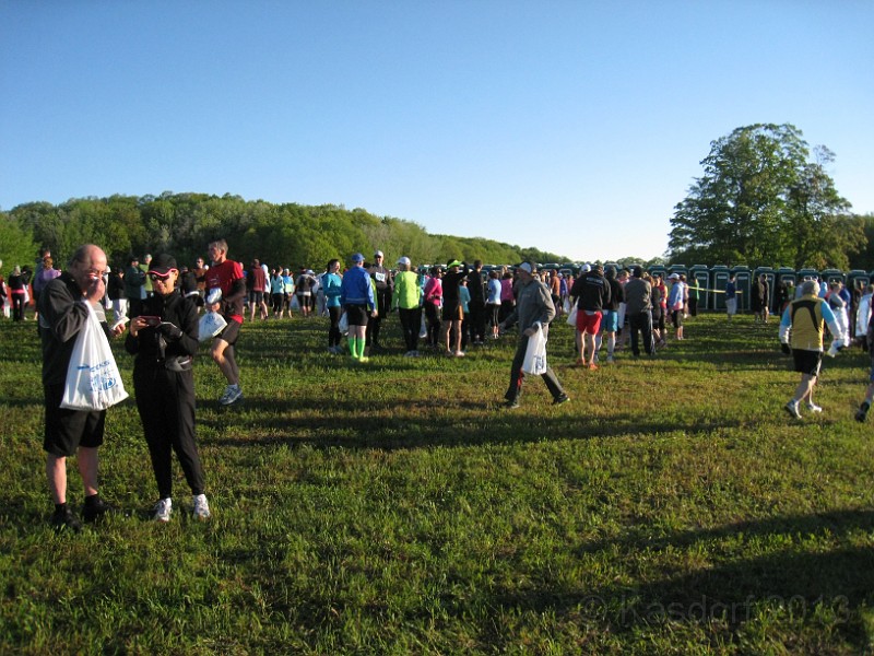 2013 Bayshore Half 042.JPG - Closer to start time people were being dropped off at a faster rate, as were the lines to the Johnny-On-The-Spot's.